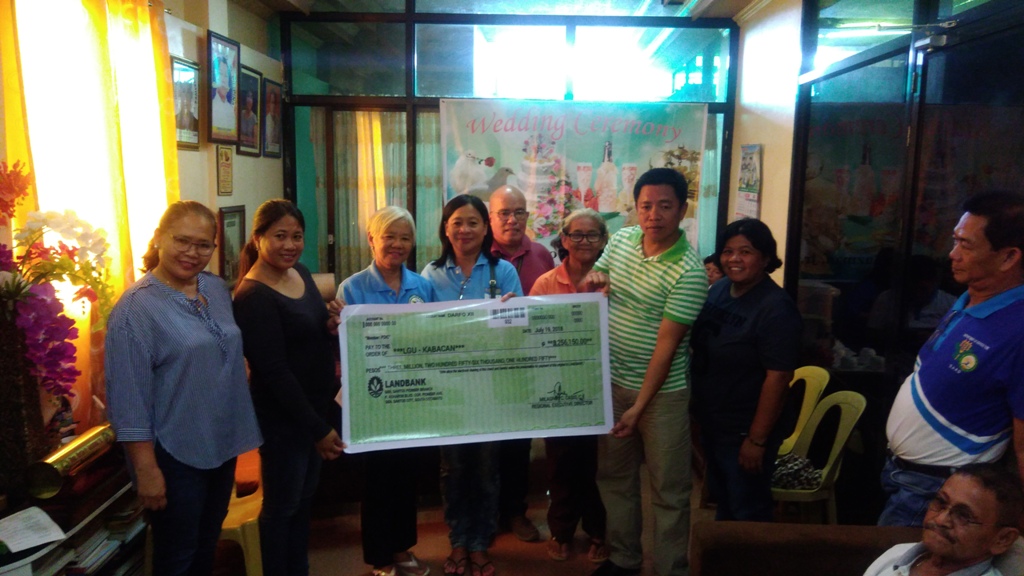 SAAD hands a P 2.26 million-worth of a check to the municipality of Kabacan