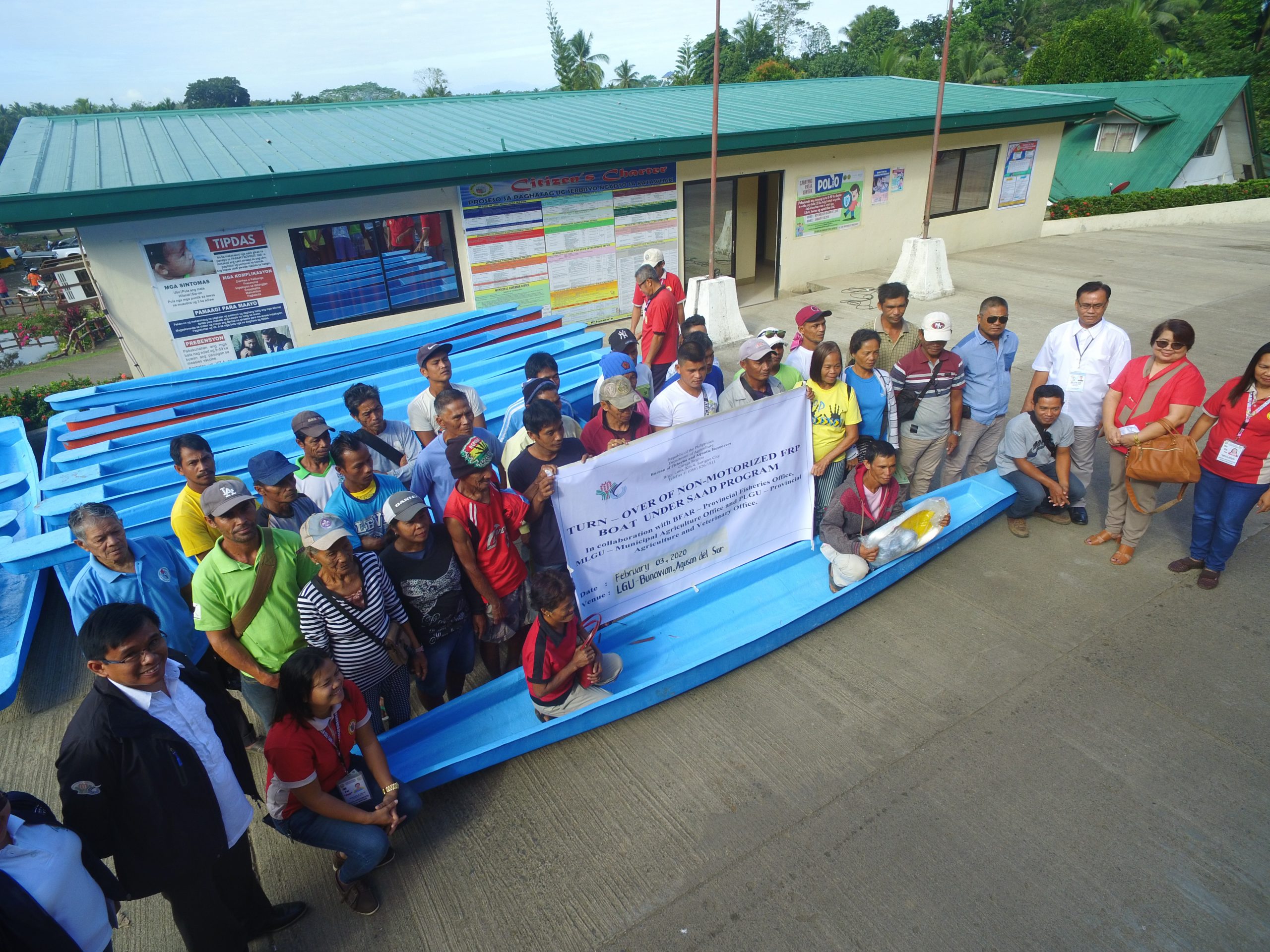 BFAR SAAD distributes boats to 30 Agusan del Sur fisherfolk